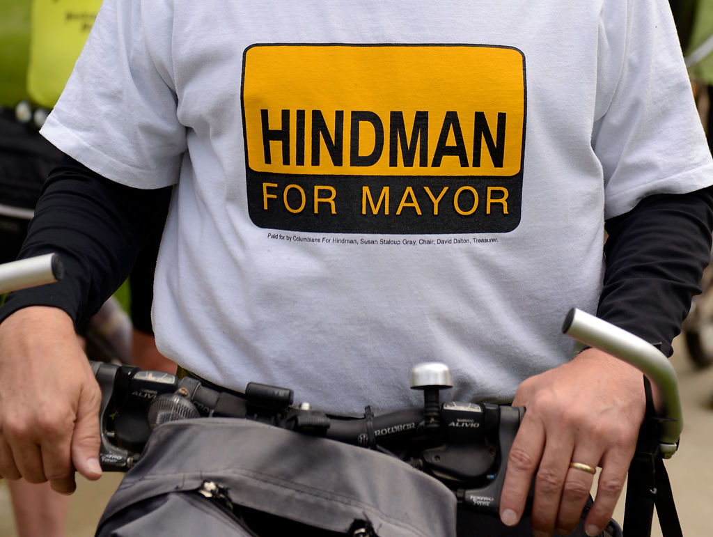 Cyclists rode from the Discovery Garden to the Calvery Church to commemorate former mayor Darwin Hindman